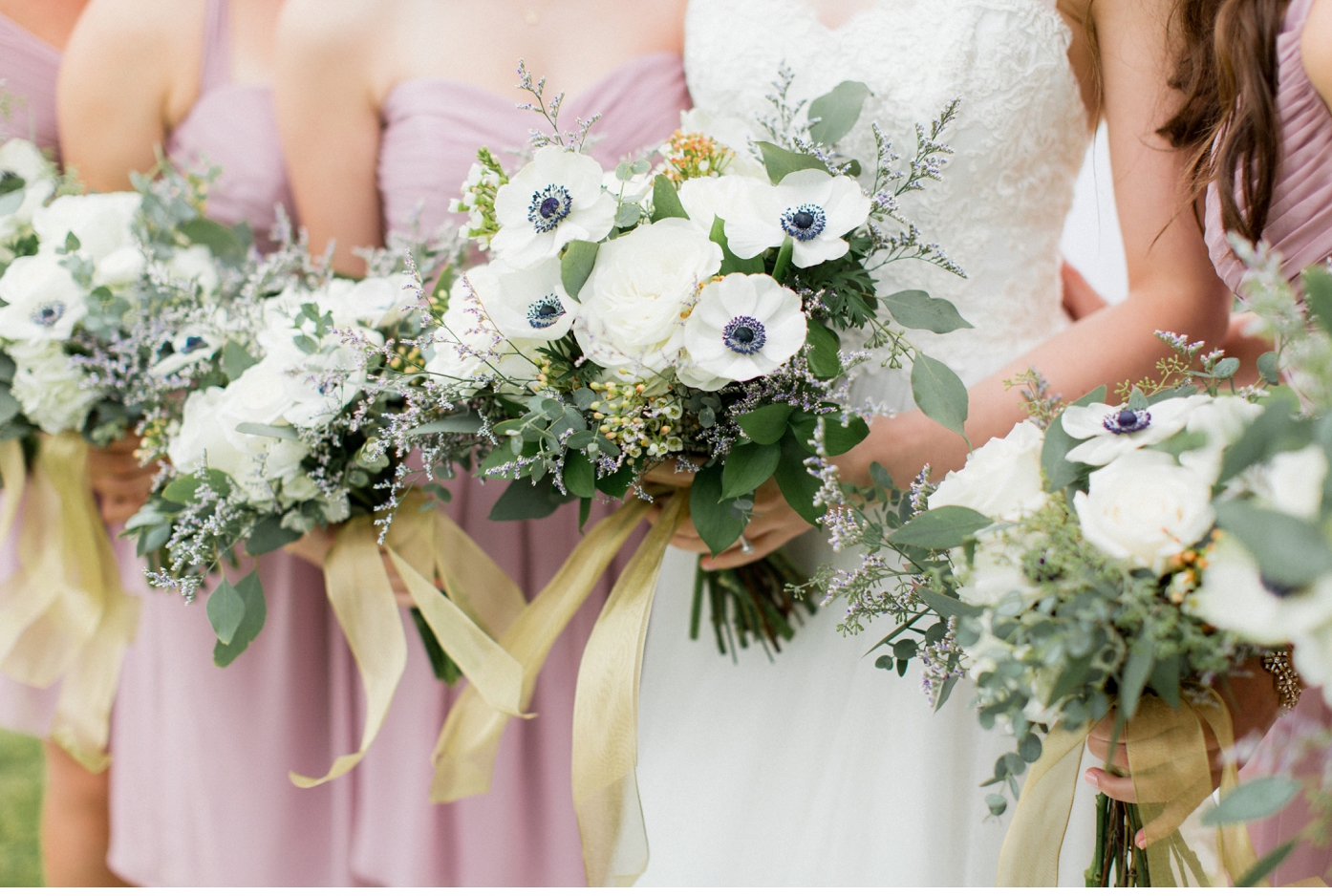 anemone, garden roses, and eucalyptus bouquets